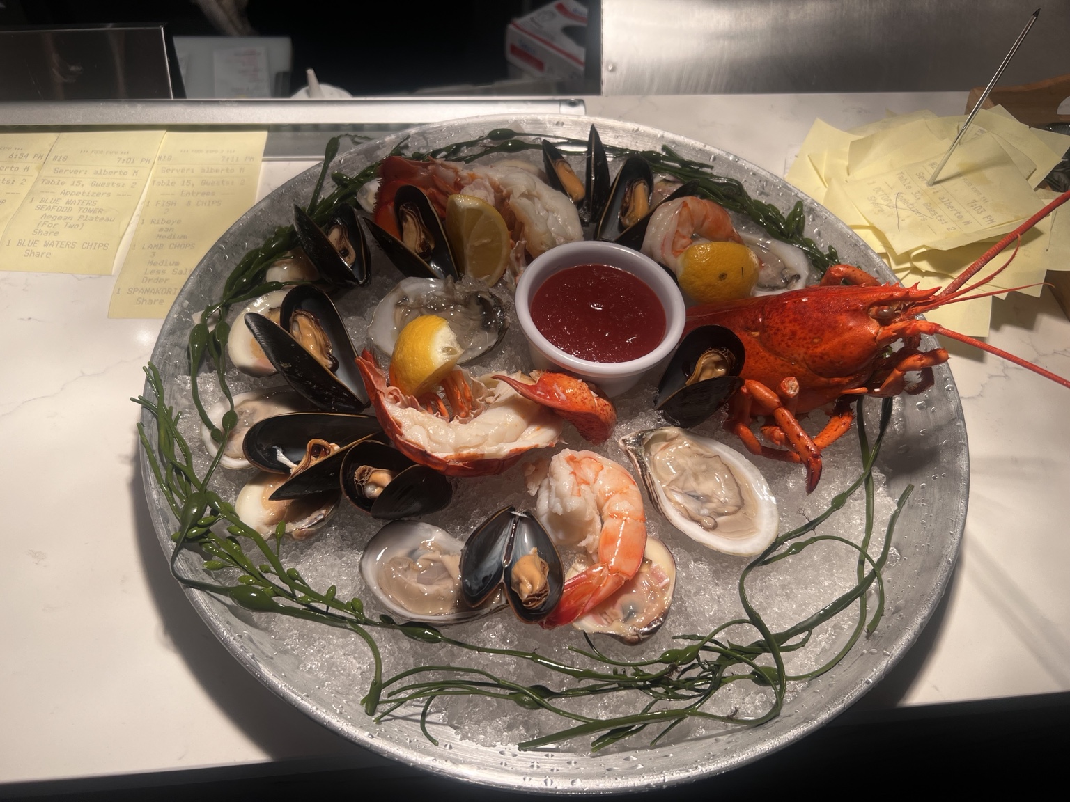 Blue Waters seafood platter served with wine